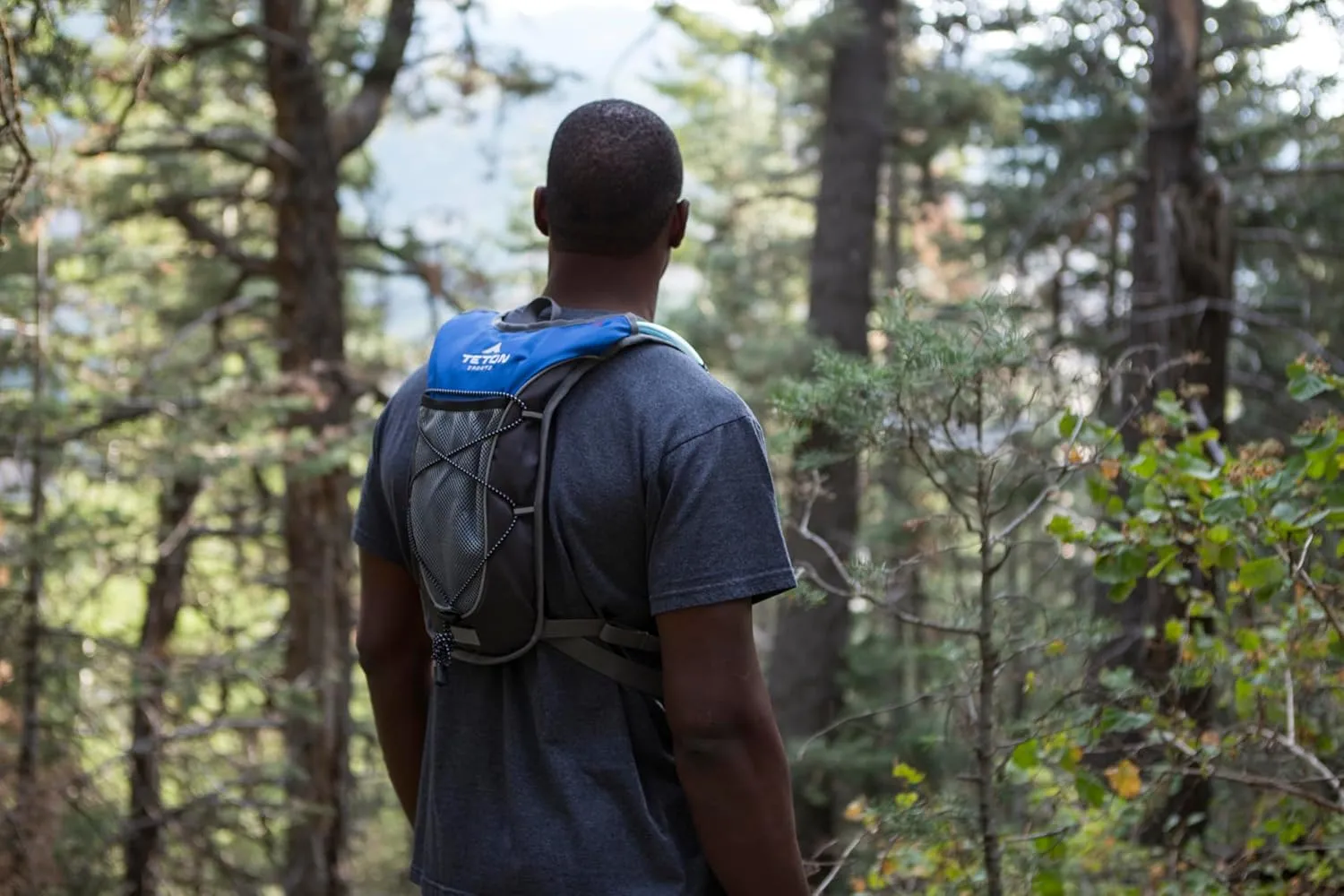 Teton Trailrunner Hydration Backpack, Hydration Pack for Hiking, Running, Cycling, Biking. Lightweight Vest for Men and Women. Sewn-in Rain Cover, 2L Water Bladder Included